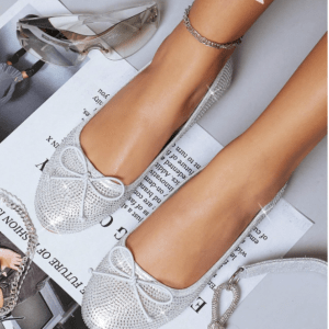 Zapatillas brillantes con lazo